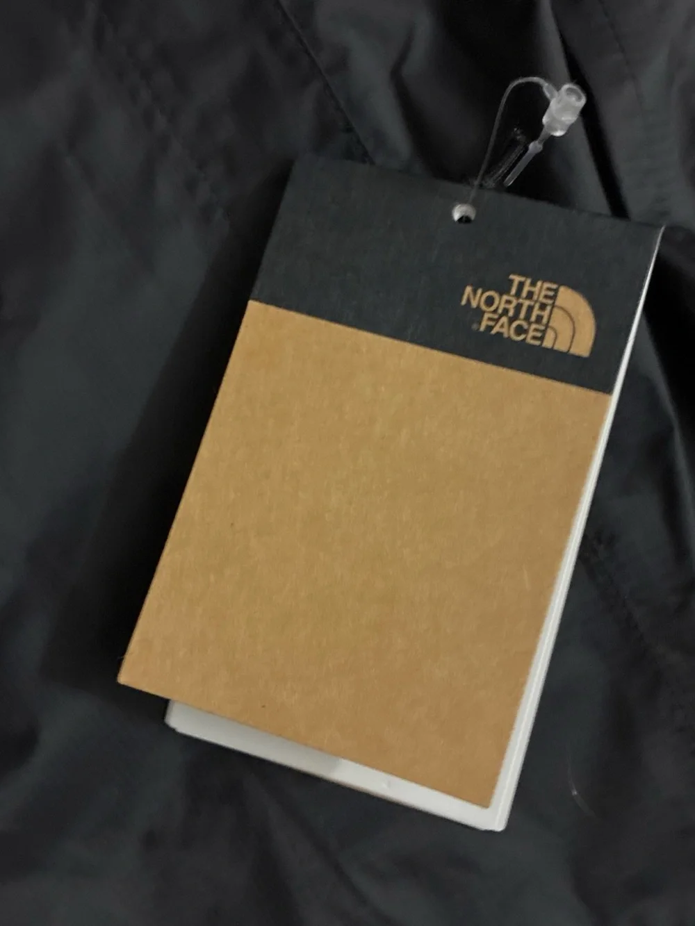 NWT. Brand New The North Face Black Dryvent Waterproof Hooded Jacket.
